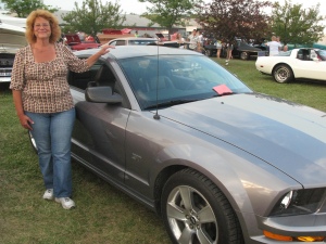 Anne Pliett of Fort Wayne with her 2006 Mustang.